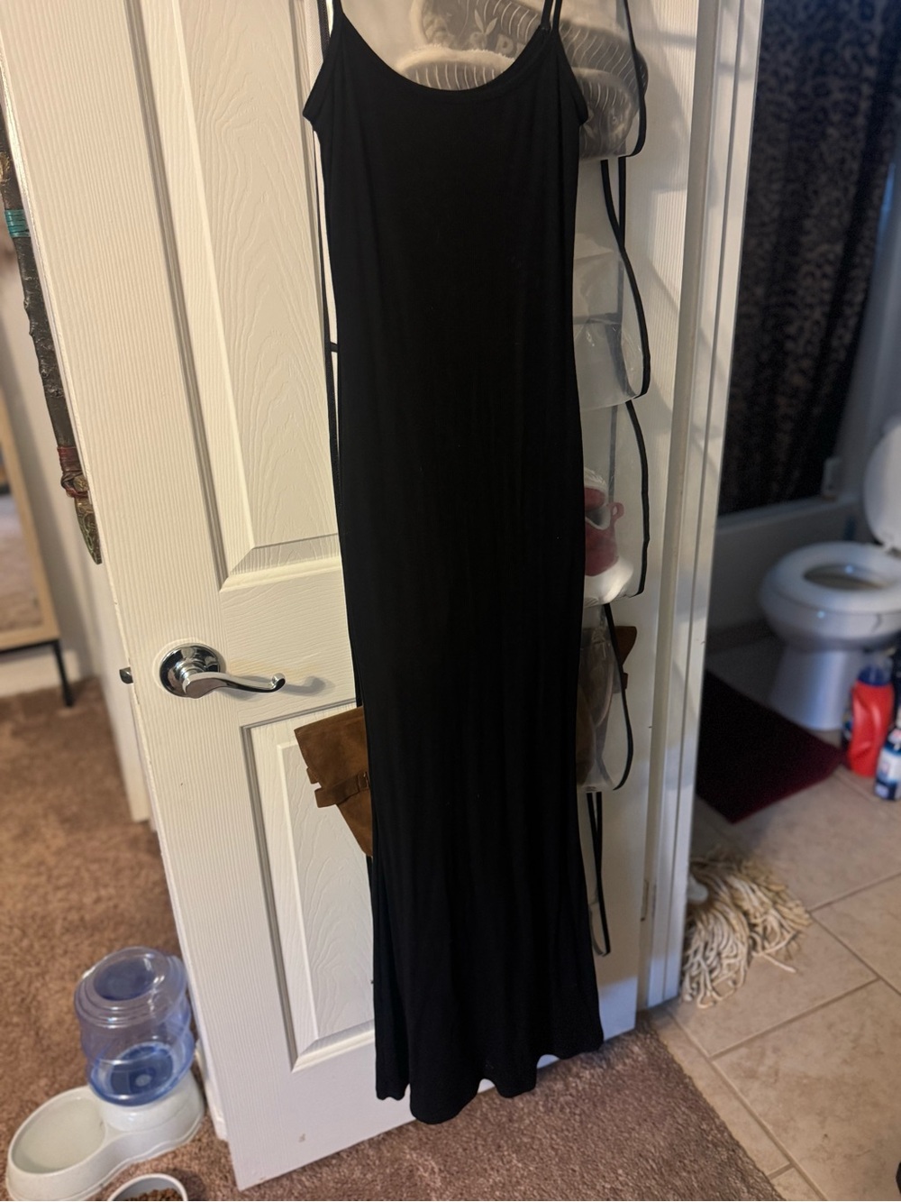 Black Women's Spaghetti Strap Maxi Dress with shape wear in side.